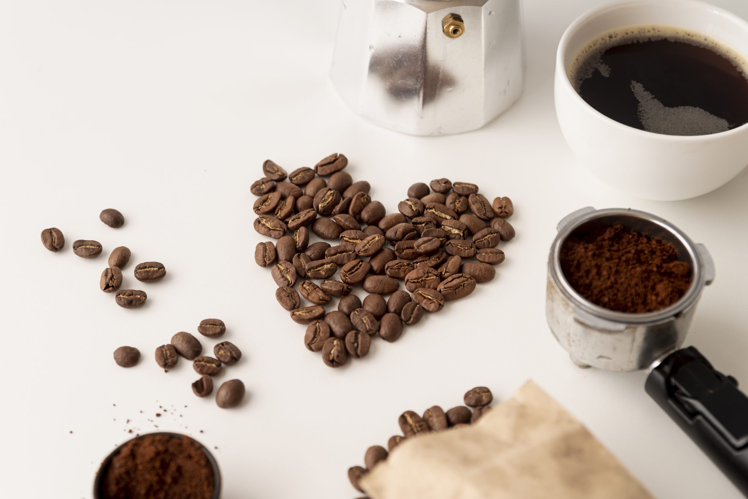 Coffee beans on the counter in the shape of a heart