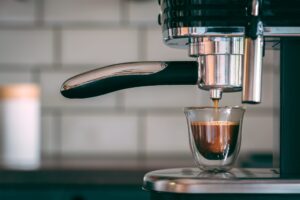 Espresso finishing brewing in the machine